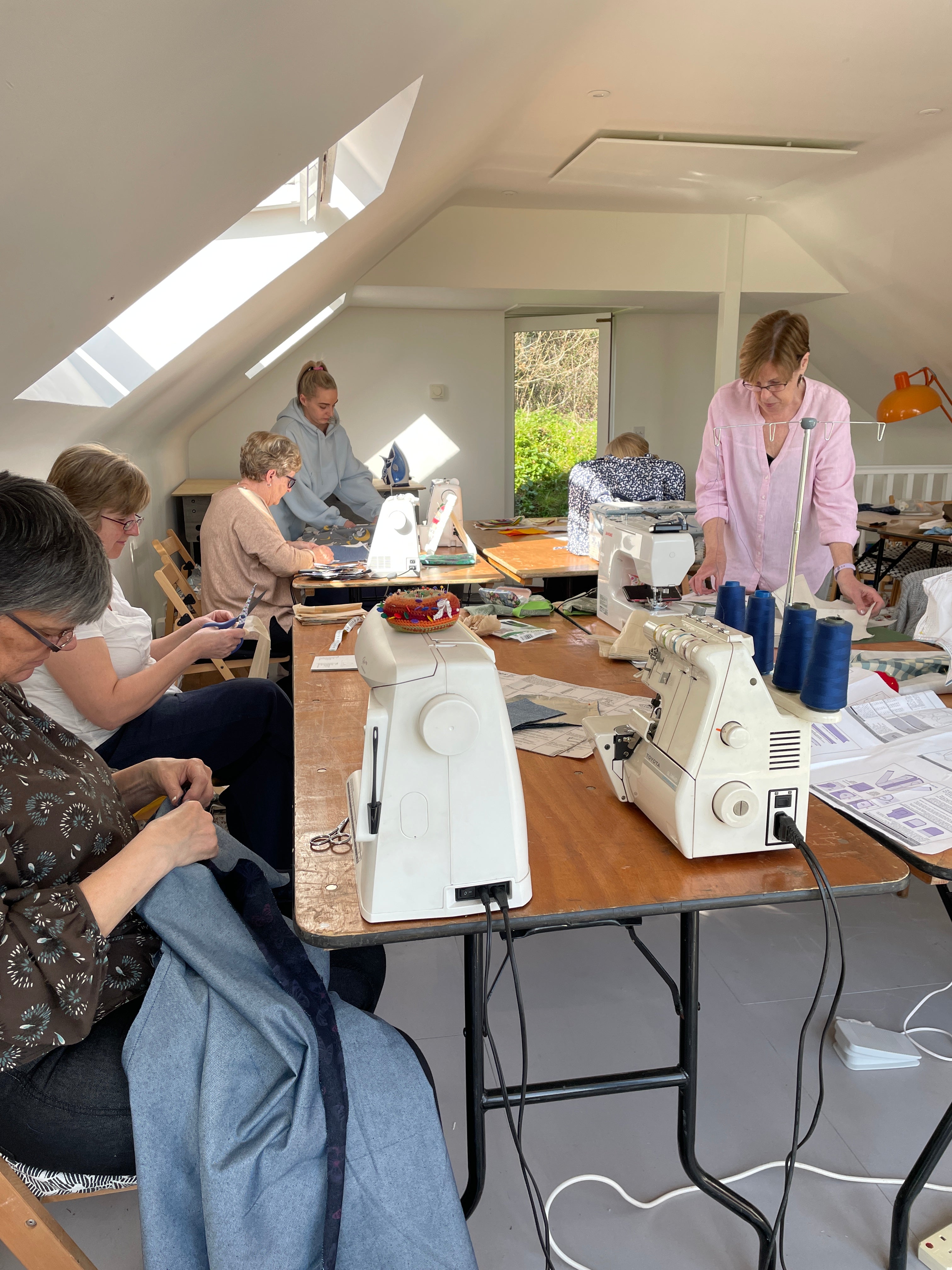 Heads down, sewing